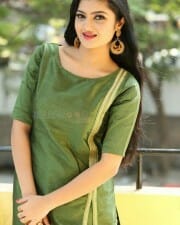 Actress Akshita Green Dress Photos 08