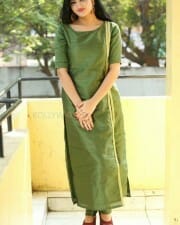 Actress Akshita Green Dress Photos 09