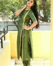 Actress Akshita Green Dress Photos 10