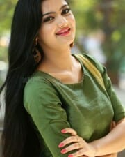 Actress Akshita Green Dress Photos 11