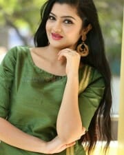 Actress Akshita Green Dress Photos 12