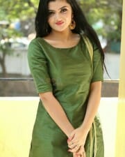 Actress Akshita Green Dress Photos 13