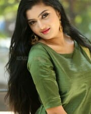 Actress Akshita Green Dress Photos 14