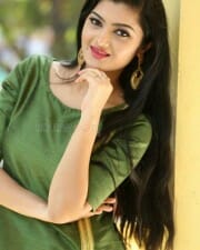 Actress Akshita Green Dress Photos 15