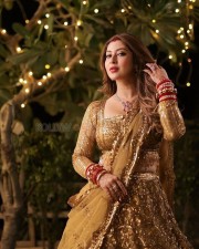 Devon Ke Dev Mahadev Actress Sonarika Bhadoria in a Golden Embroidered Square Neckline Blouse with a Matching Lehenga Skirt and Sheer Dupatta Pictures 05