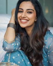 Divine Beauty Meenakshi Chaudhary in a Blue and Golden Zari Anarkali Suit Photos 01