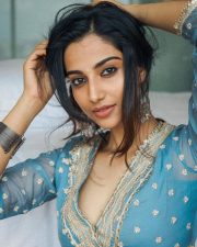 Divine Beauty Meenakshi Chaudhary in a Blue and Golden Zari Anarkali Suit Photos 03