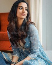 Divine Beauty Meenakshi Chaudhary in a Blue and Golden Zari Anarkali Suit Photos 04