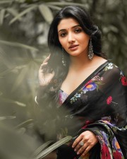 Jailer Actress Mirnaa Menon in a Black Printed Saree Pictures 01