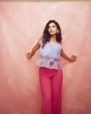 Stylish Meenakshi Chaudhary in a Laveder Top and Pink Pant Photoshoot Stills 03