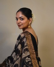 Actress Ahaana Krishna in a Black Printed Saree with a Sleeveless Black Blouse Photos 04