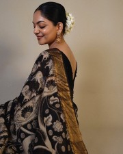 Actress Ahaana Krishna in a Black Printed Saree with a Sleeveless Black Blouse Photos 06