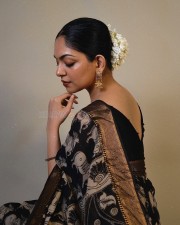Actress Ahaana Krishna in a Black Printed Saree with a Sleeveless Black Blouse Photos 07