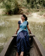 Beautiful Ananthika Sanilkumar in a Light Blue Half Saree with a Print Blouse and Skirt Pictures 02