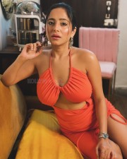 Curvaceous Kate Sharma in a Hot Orange Cut Out Topless Dress Photos 05