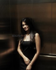 Pretty Ananthika Sanilkumar in the lift in a Black Sleeveless Bodycon Dress Photos 04