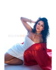 Sexy Shehnaaz Gill in a White Off Shoulder Dress with a Red Cape Pictures 04