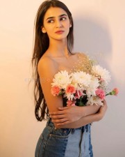 Actress Prakriti Pavani Topless and Hiding Her Breasts with Flowers and in a Denim Pant Photos 01