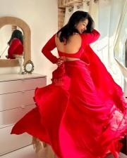 Beautiful Nikita Sharma in a Bright Red Lehenga Photos 01