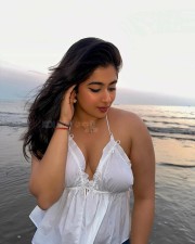 Bold and Enchanting Nikita Sharma in a White Ruffle Mini Dress with Spaghetti Strap Cami Dress Photos 03