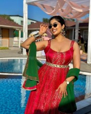 Curvy Beauty Nikita Sharma in a Red Zarisha Suit Photoshoot Stills 04