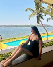 Desirable Nikita Sharma in a Black Sleeveless Spaghetti Strap Midi Dress Pictures 01