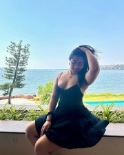 Desirable Nikita Sharma in a Black Sleeveless Spaghetti Strap Midi Dress Pictures 02