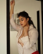 Hot Nikita Sharma in Cream Bra White Shirt and Red Pant Photos 03