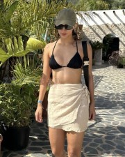 Stunning Tripti Dimri in a Black Bikini with White Wrap Skirt Photos 02