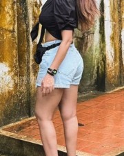 Sexaholic Actress Shama Sikander in a Mini Denim Shorts and Satin Black Top Photos 02