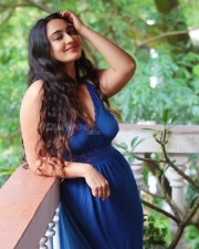 Dazzling Megha Shukla in a Blue Maxi Dress with Plunging Neckline Photos 04