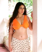 Desi Beauty Megha Shukla in a Printed Skirt and Orange Bralette Photos 03