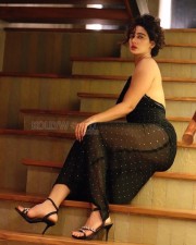 Enchanting Megha Shukla in a Printed Black Deep Neck Maxi Dress Photos 01