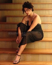 Enchanting Megha Shukla in a Printed Black Deep Neck Maxi Dress Photos 03