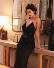 Enchanting Megha Shukla in a Printed Black Deep Neck Maxi Dress Photos 05