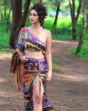 Glam Megha Shukla Navel in a Colourful Dress Photos 03