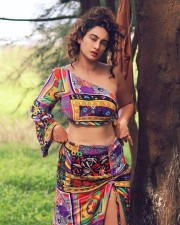 Glam Megha Shukla Navel in a Colourful Dress Photos 04