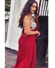 Hypnotic Megha Shukla in a Red Saree with Sleeveless Multi Coloured Blouse Photos 04