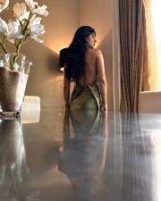 Sexy Kanika Mann in a Green Halterneck Deep Neck Back Knot Dress Photos 02