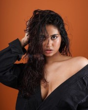 Seductive Srushti Bannatti Cleavage in a Black Open Robe Pictures 02