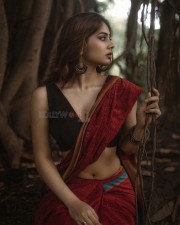 Sexy Bombshell Srushti Bannati Cleavage and Navel in a Red Printed Saree with a Sleeveless Black Blouse Photos 04