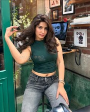 Bai Ga Actress Neha Khan in a Green Crop Top and Grey Jeans Photos 02